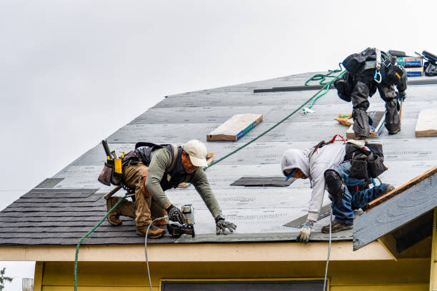 Professional Roofing technician working in Prudenville, MI